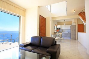 Villa | Área de sala de estar | Televisión de pantalla plana 