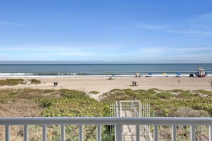 On the beach, sun loungers, beach towels