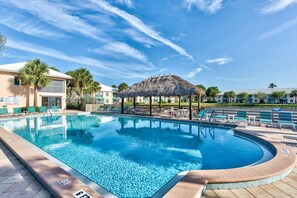 A swimming pool with lounge chairs and a thatched gazebo. - Ferentino Vacation Rental by NFVH (Naples)