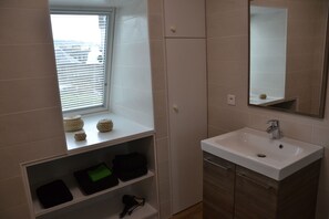 Hair dryer, towels, soap, toilet paper