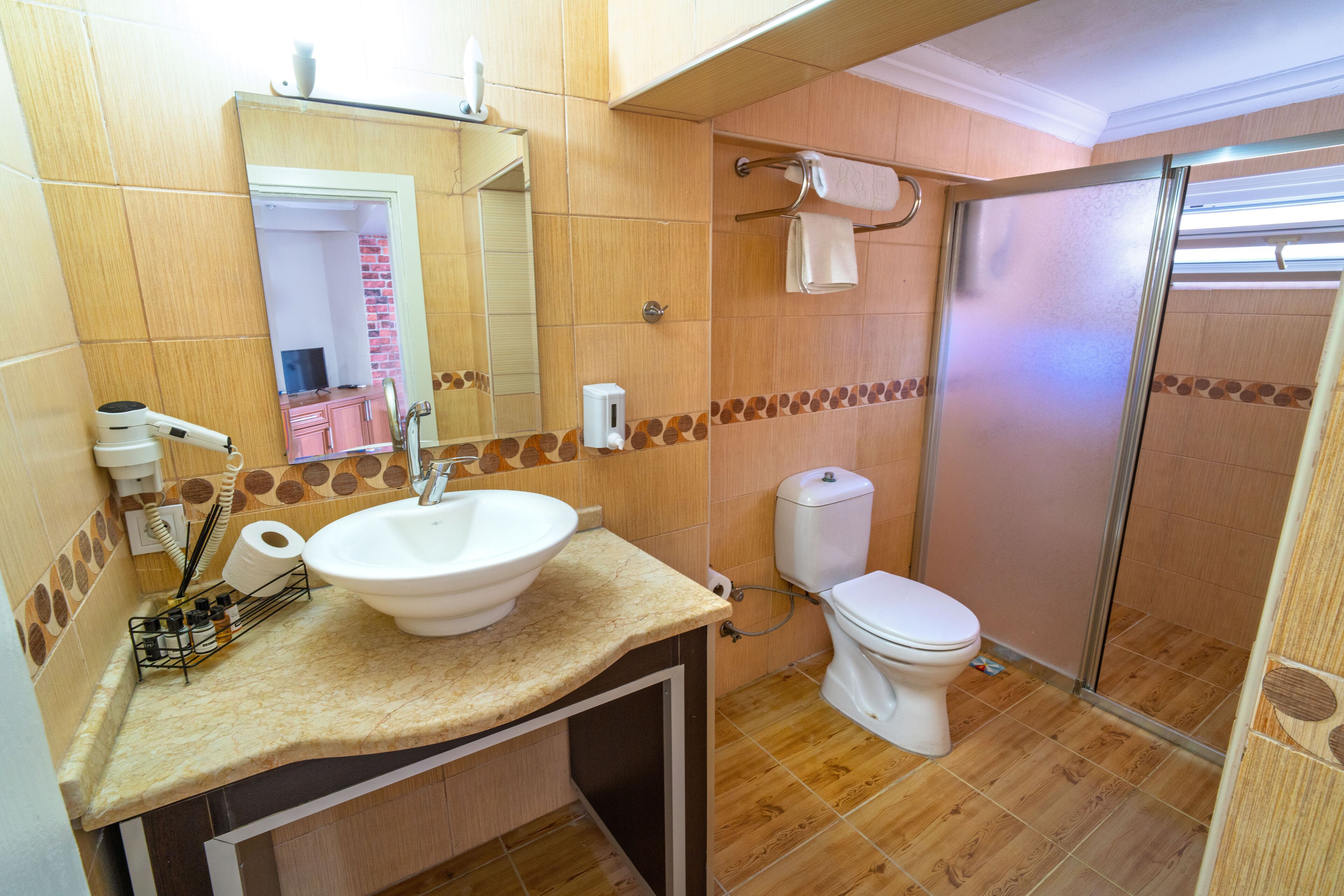 economy room, 1 double bed | bathroom | shower, rainfall showerhead, hair dryer, slippers