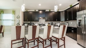 Villa, 6 Bedrooms | Private kitchen | Microwave, oven, stovetop, dishwasher - Champions Gate 1564 TL (Davenport)