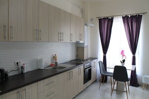 Deluxe Studio | Private kitchen | Full-size fridge, microwave, stovetop, espresso maker