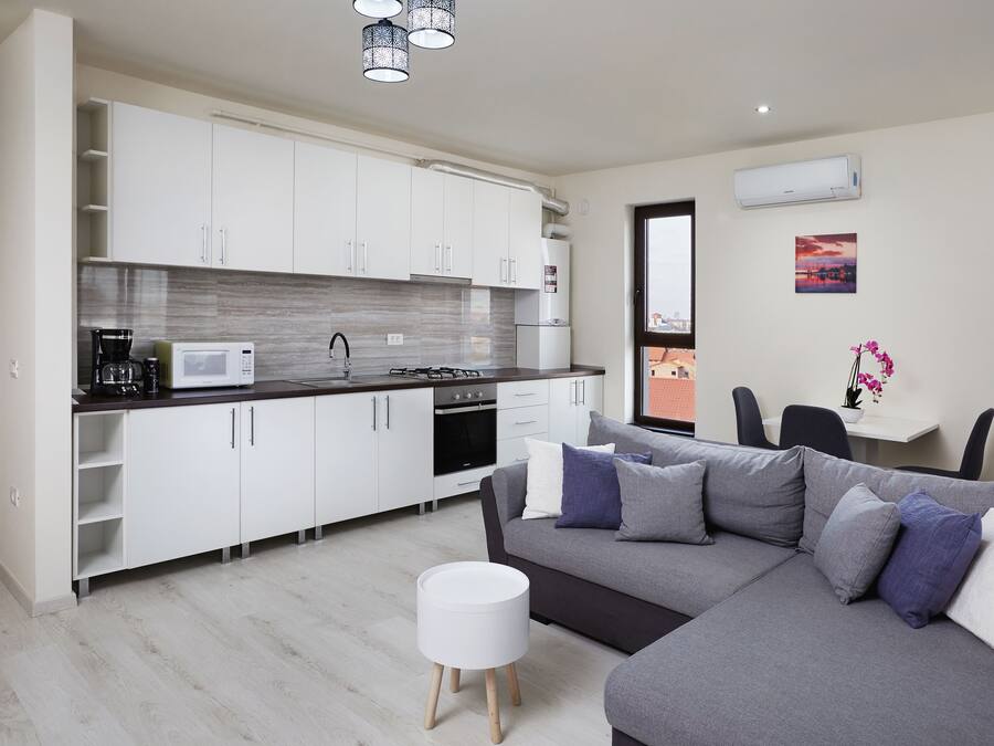 City Penthouse | Private kitchen | Full-sized fridge, microwave, stovetop, espresso maker