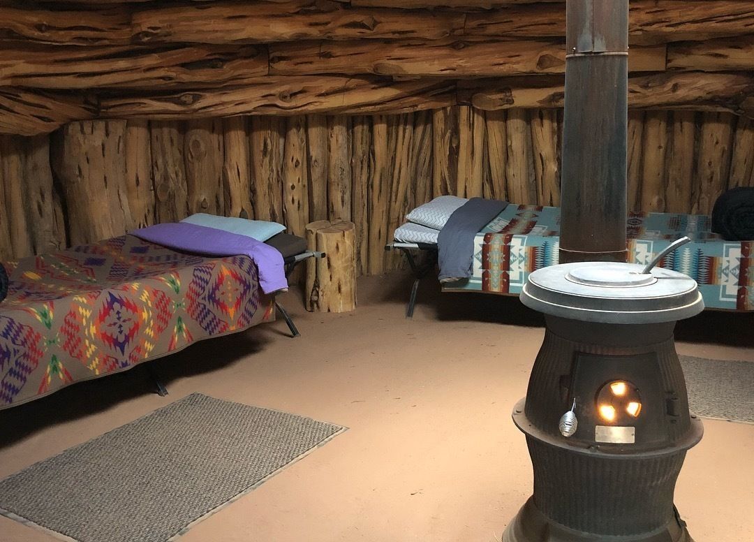 Traditional Earth and Log Navajo Hogan