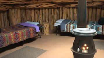 Traditional Earth and Log Navajo Hogan
