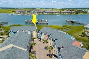 A residential area with houses and a marina.