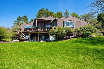 Bright and airy home with sunset views less than a mile to the lake and village