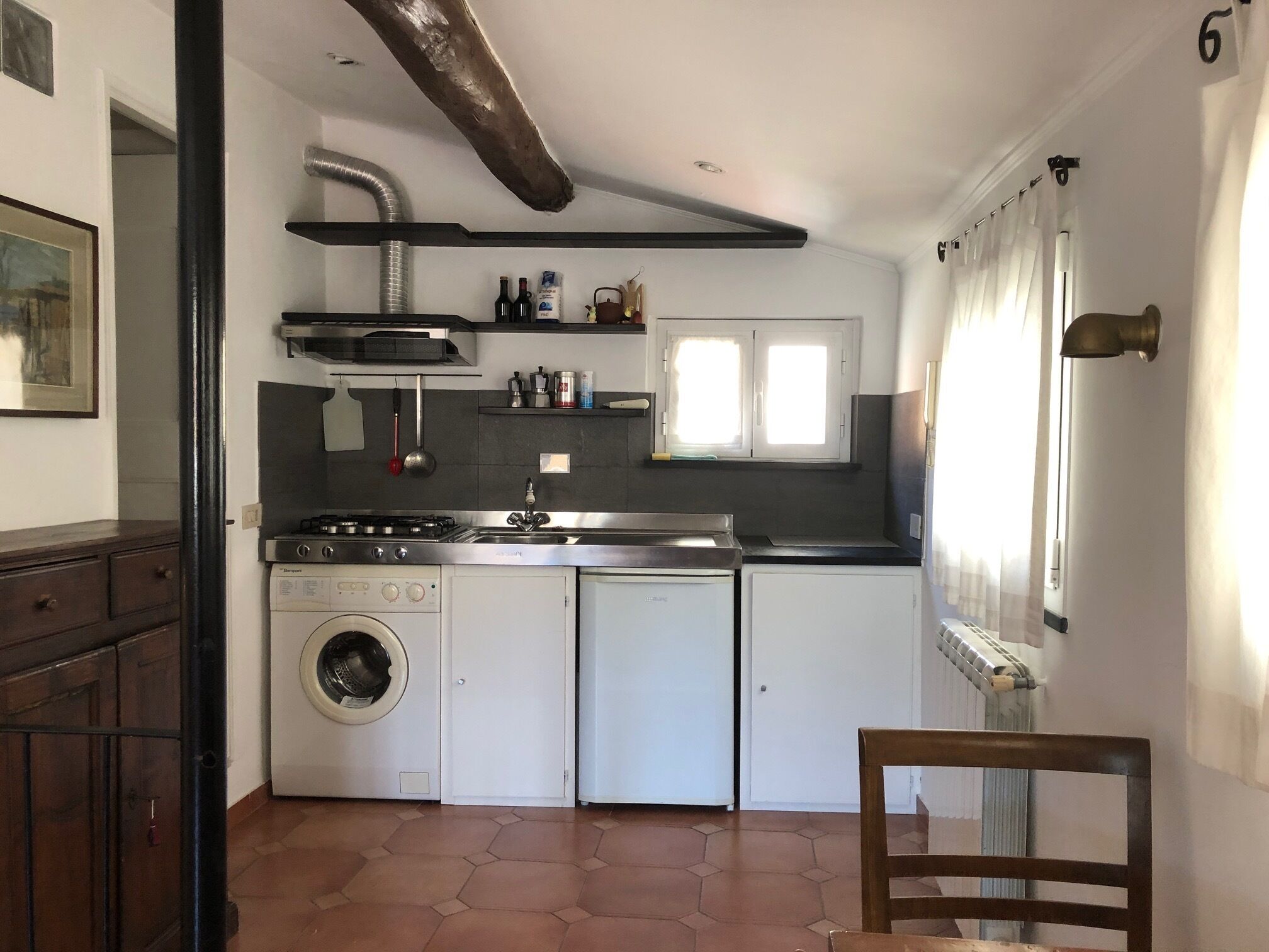 Fridge, coffee/tea maker, cookware/dishes/utensils