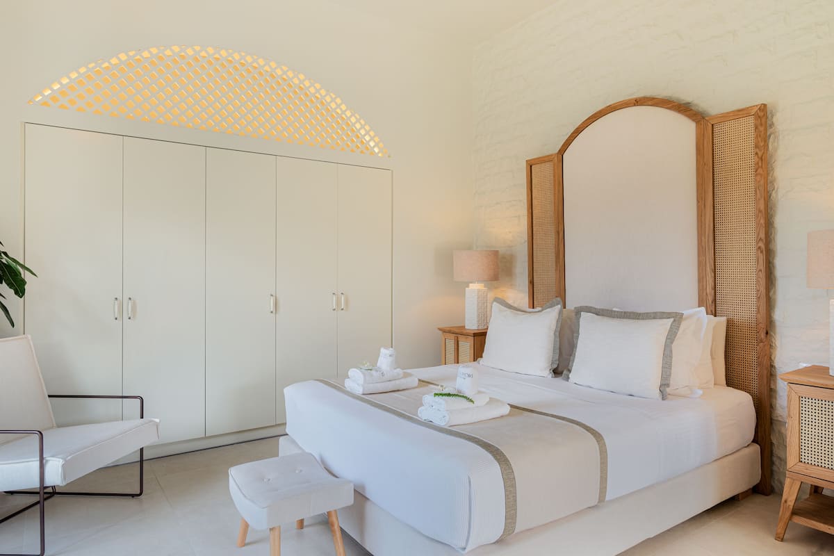 Manoglia Suite | 1 dormitorio, ropa de cama de alta calidad, edredones de plumas