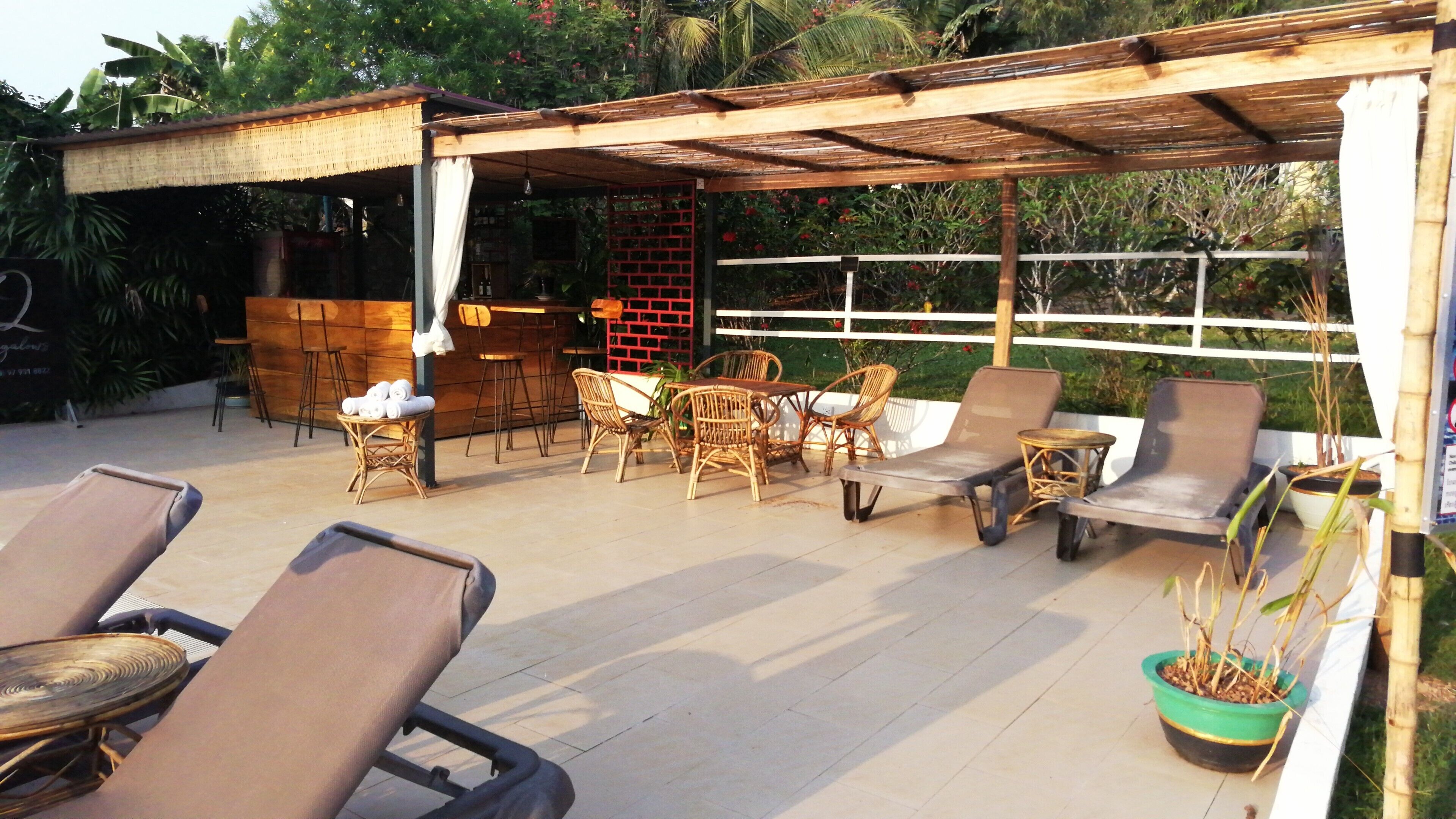 Outdoor pool, pool umbrellas, pool loungers