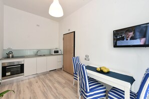 Fridge, microwave, oven, stovetop - CdApartments - 2-Min Walk to the Beach & Town Center (Minori)