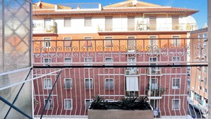 A multi-story building with balconies and a clear sky. - LOVELY APARTMENT CENTER ROME 100M FROM VATICAN INTERNET FREE WI-FI (Roma)