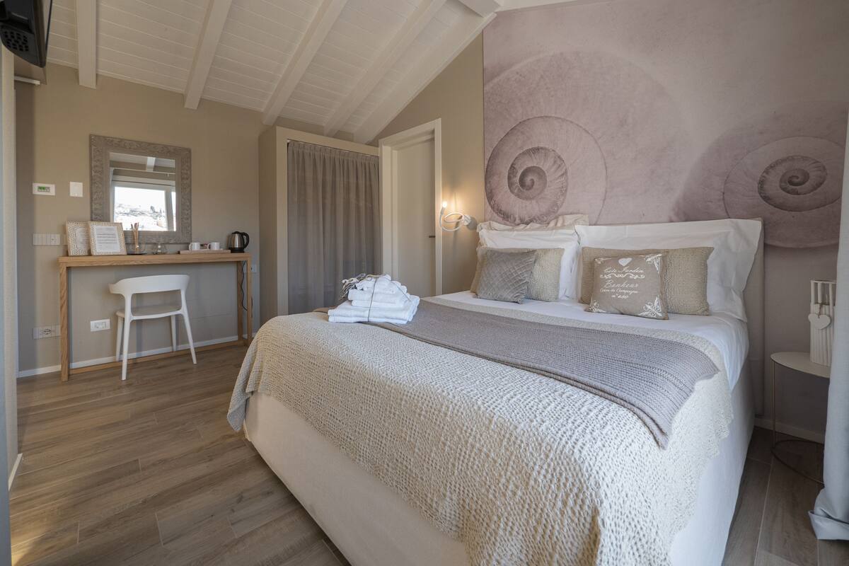 Apartment, Sea View | Down duvets, minibar, in-room safe, blackout curtains
