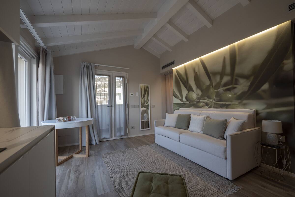 Studio, Sea View | Living area | Flat-screen TV, Netflix
