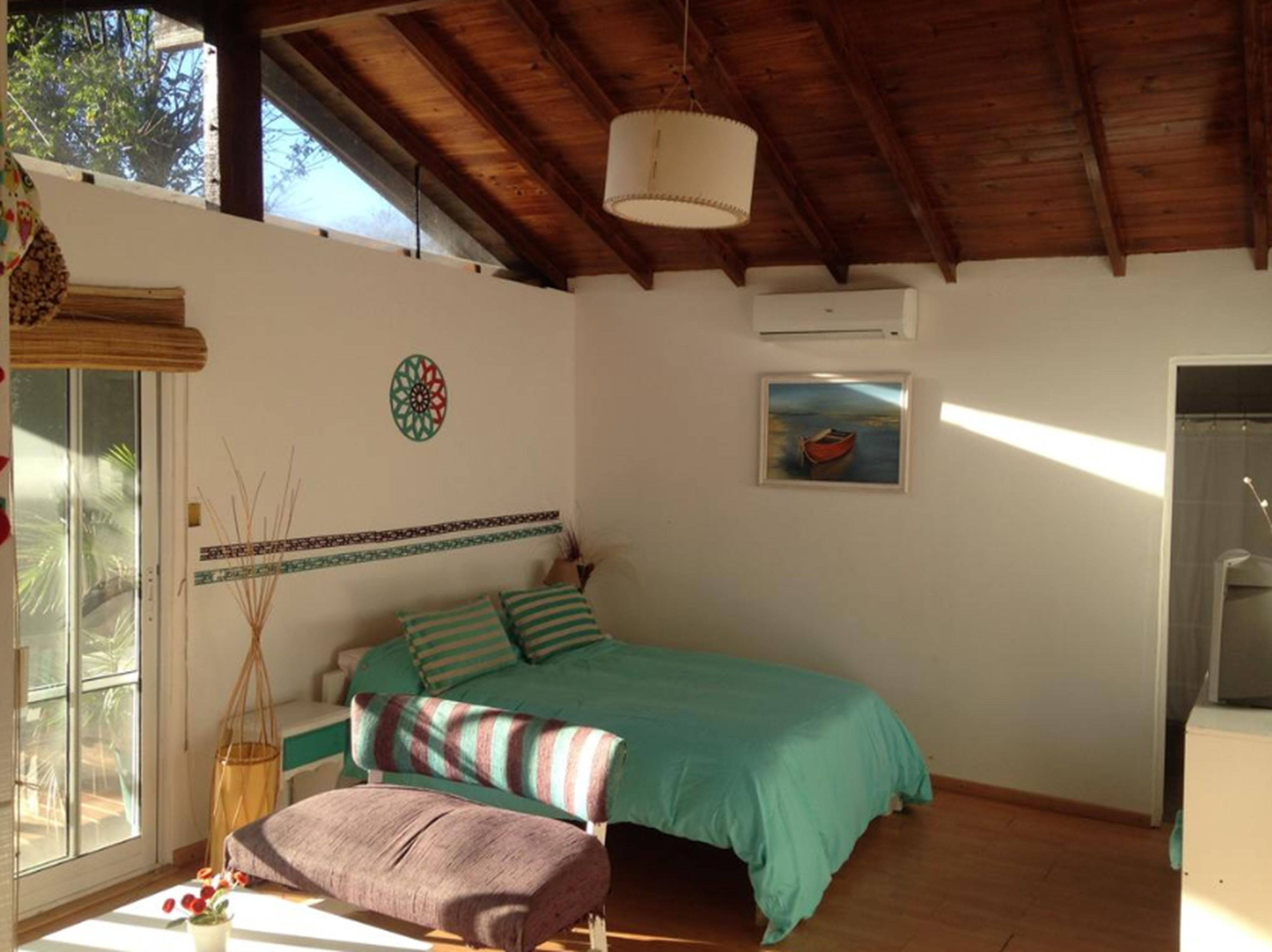 Premium Cabin, 1 Queen Bed, Garden View | Down comforters, memory foam beds, blackout drapes, bed sheets