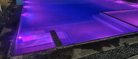 Seasonal outdoor pool, pool umbrellas, pool loungers