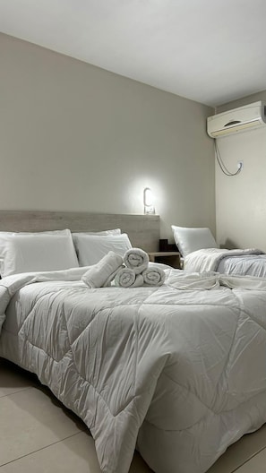 Apartamento Triplo Standard | Cofres nos quartos, cortinas blackout, quartos à prova de som