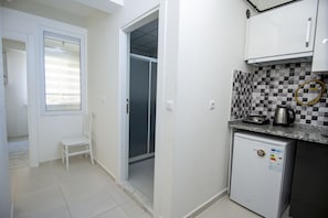 Apartamento família | 2 quartos, frigobar, escrivaninha, quartos à prova de som