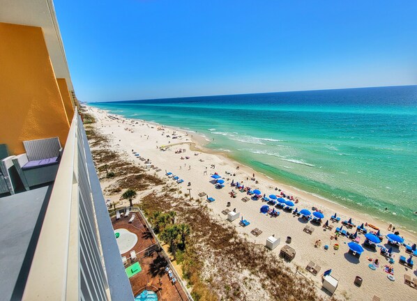 On the beach, sun-loungers