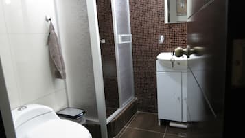 Shower, free toiletries, towels, soap