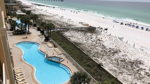 A hotel with a swimming pool, beach access, and a view of the ocean. - Azure -  Penthouse Level - FREE Beach Service for 4 - Amazing! 3BR 3BA  Sleeps 8 (Fort Walton Beach)