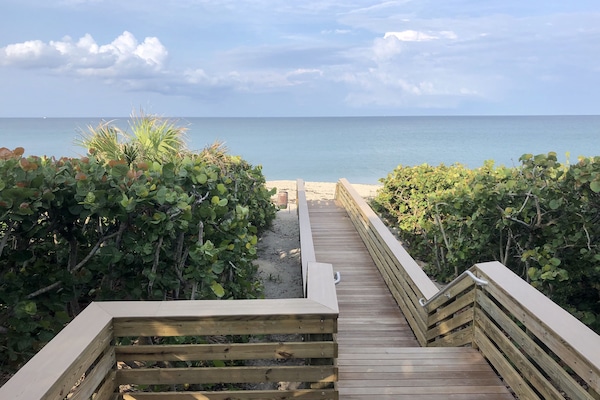 Jupiter beach, just across the park, with its wooden walkways and sparkling sea!