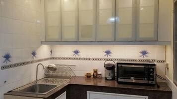 Fridge, microwave, coffee/tea maker, electric kettle