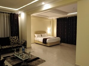 In-room safe, desk, laptop workspace, blackout curtains