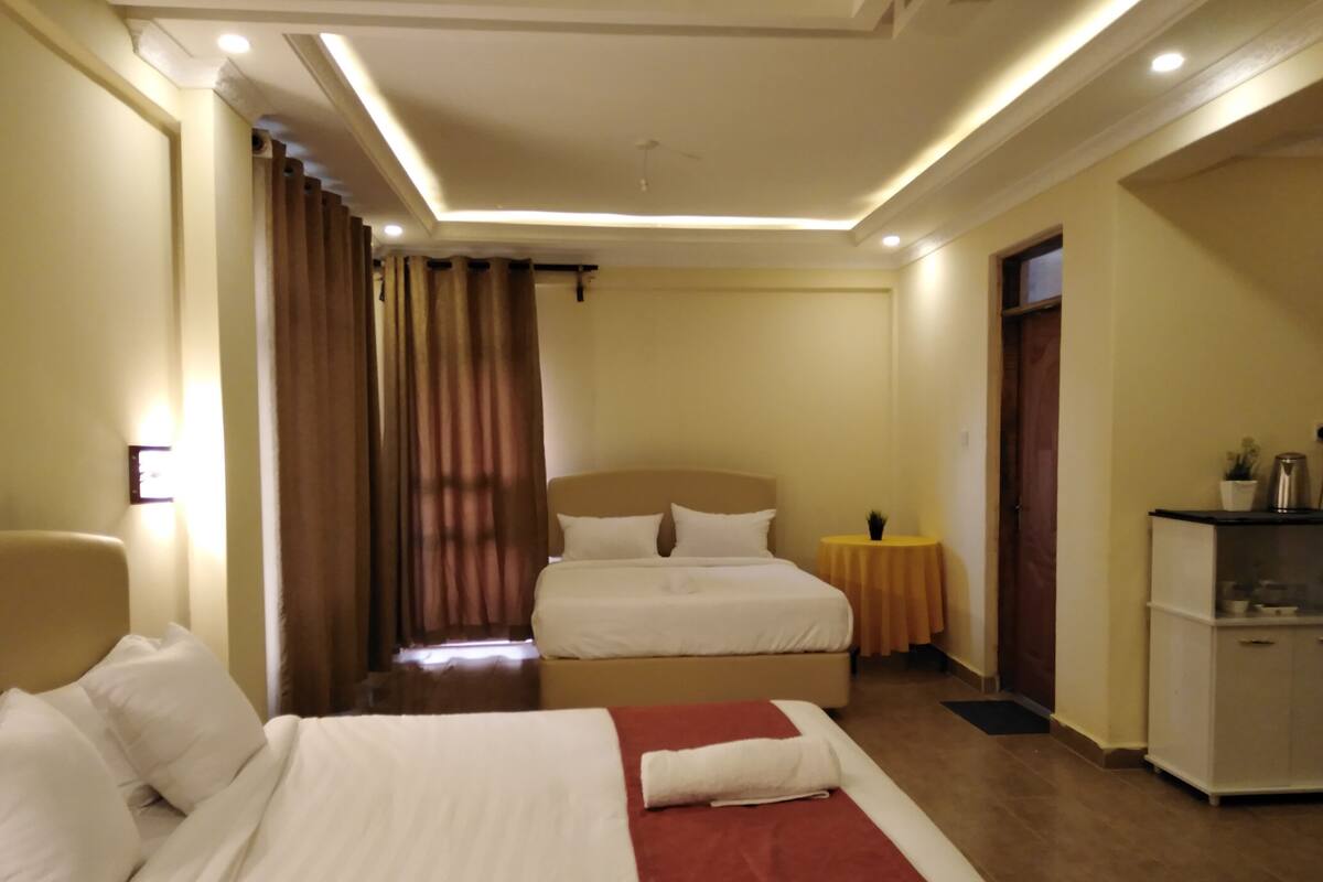 Deluxe Twin Room, 2 Twin Beds, Garden View | In-room safe, desk, laptop workspace, blackout drapes