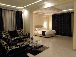 In-room safe, desk, laptop workspace, blackout curtains - Lantana Comfy (Kakamega)