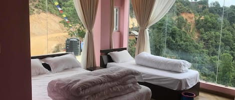 Family Room, Multiple Beds, Mountain View | 1 bedroom, laptop workspace, free WiFi, bed sheets