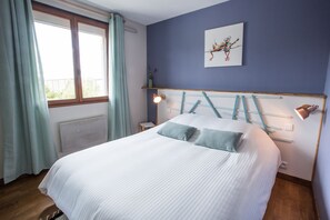 2 habitaciones, tabla de planchar con plancha, wifi y ropa de cama 