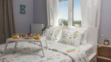 2 bedrooms, desk, iron/ironing board, travel crib
