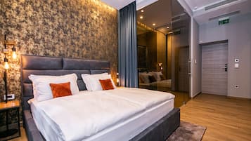 Deluxe Double Room (203) | Minibar, in-room safe, individually decorated, blackout drapes