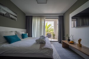 Deluxe Double Room, Pool View | Premium bedding, minibar, in-room safe, individually decorated