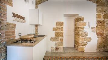 Fridge, coffee/tea maker, electric kettle, cookware/dishes/utensils