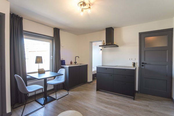 Private living room with fully equipped kitchen