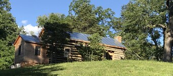 Historical Dogtrot Chestnut Log Cabin.