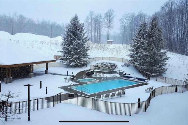 Outdoor heated pool and two spas