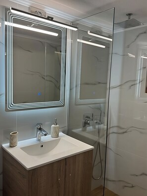 Eco-friendly toiletries, hair dryer, towels, soap