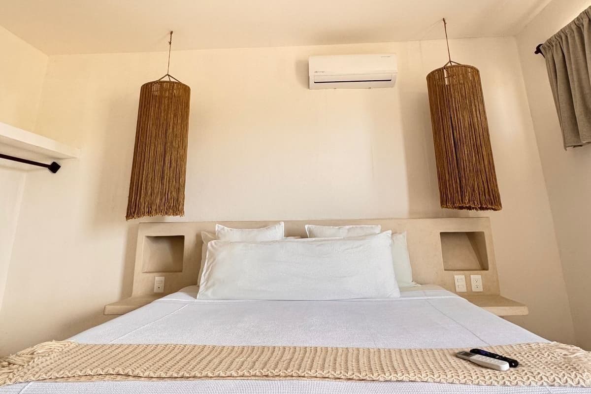 Economy Room | 1 bedroom, premium bedding, minibar, in-room safe