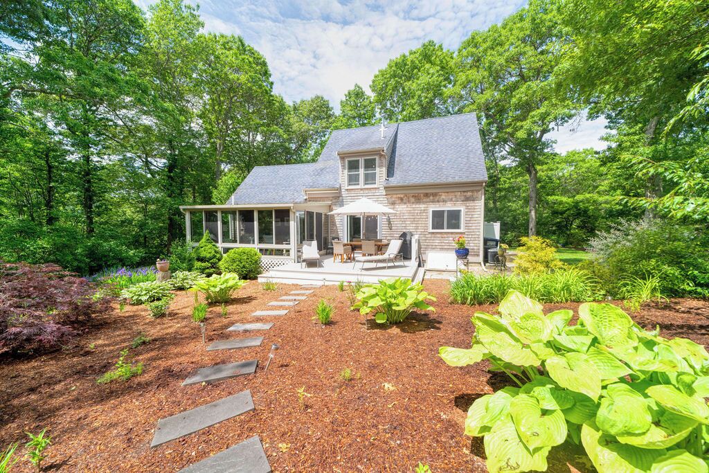 Beautiful 3 bedroom 2 bath home on quiet street just feet from lovely Johns Pond