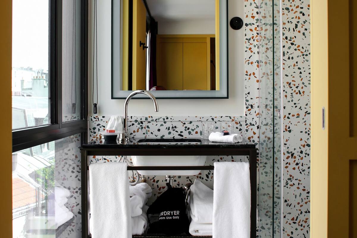 superior room, 1 king bed | bathroom | rainfall showerhead, free toiletries, hair dryer, bathrobes