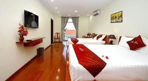 Family Quadruple Room, 2 Queen Beds | Minibar, desk, blackout drapes, soundproofing - Hoi An Green Channel Homestay (Da Nang)
