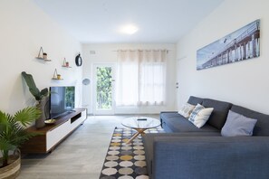 Deluxe appartement | Woonruimte | Flatscreentelevisie en Netflix