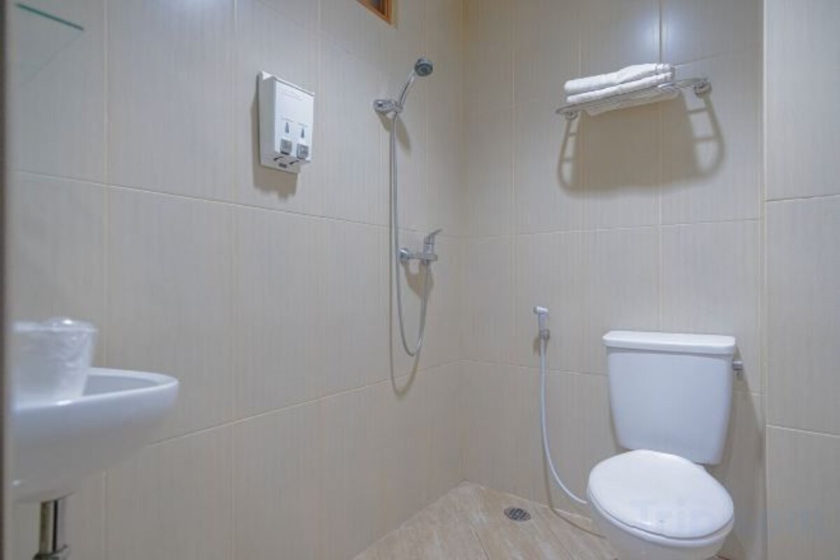 Shower, slippers, towels, soap