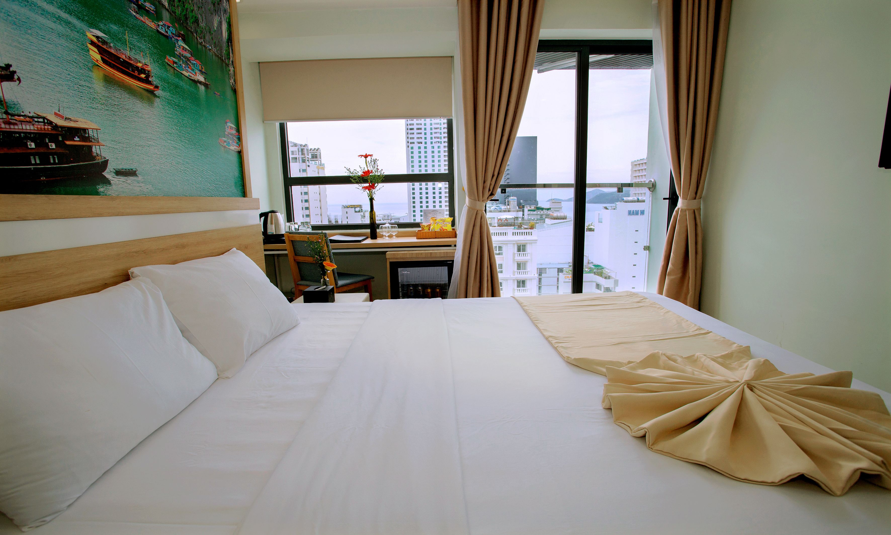 Ropa de cama de alta calidad y minibar 