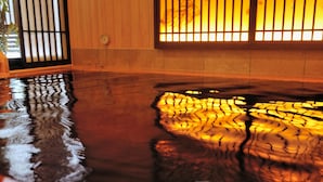 A room with a wooden floor reflecting light from a window with vertical blinds. - Onyado Nono Asakusa Natural Hot Springs (Tokyo)