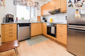 City Apartment, 1 Bedroom | Private kitchen | Full-size fridge, oven, stovetop, dishwasher - Apartment S23 (Reykjavik)